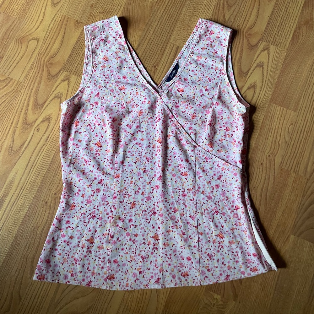 Sleeveless pink floral blouse